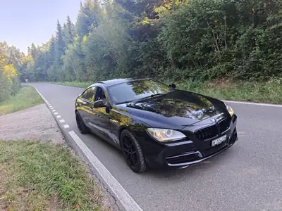 BMW 640i Gran Coupé — Coupé élégant, motorisation puissante et jantes Ferrada 20" — fianco