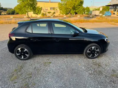 Opel Corsa-e 156 GS 51 kWh — Citadine électrique performante, 10 000 km seulement — vista posteriore