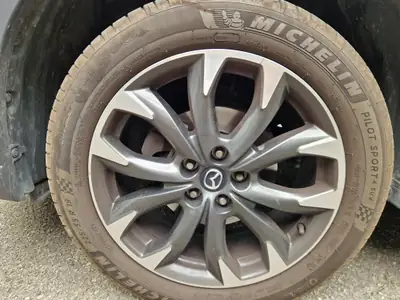 Mazda CX-5 2.2 D Revolution AWD — SUV robuste, tout-terrain, très basse consommation — détail