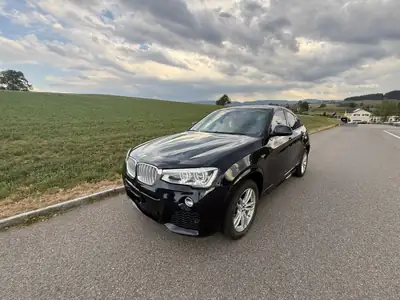 BMW X4 xDrive 35i M Sport — Coupé SUV haute performance, équipement M complet — side view