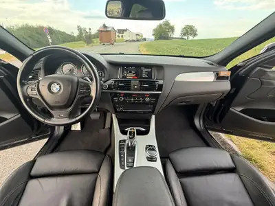 BMW X4 xDrive 35i M Sport — Coupé SUV haute performance, équipement M complet — detail