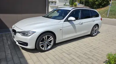 BMW 320d xDrive Touring — Diesel automatique, traction intégrale, break familial — côté