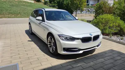 BMW 320d xDrive Touring — Diesel automatique, traction intégrale, break familial — intérieur