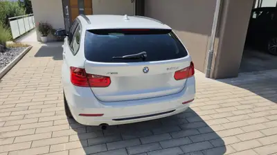 BMW 320d xDrive Touring — Diesel automatique, traction intégrale, break familial — tableau de bord