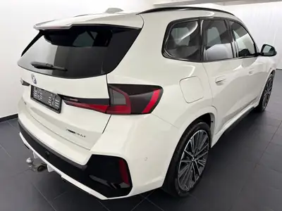 BMW X1 xDrive 20d 48V M Sport — SUV compact premium diesel hybride, première main — arrière