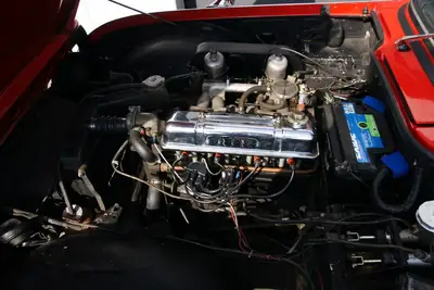 Triumph TR4A IRS 1966 — Cabriolet anglais rare avec Overdrive, historique suisse impeccable — Thumbnail 8