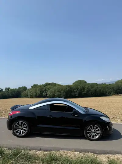 Peugeot RCZ 1.6 Turbo 156 ch — Coupé sportif affûté, sans accident — Heckansicht