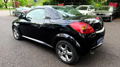 OPEL Tigra 1.8 Sport — Cabriolet compact dynamique, noir métallisé, 111'000 km — tableau de bord