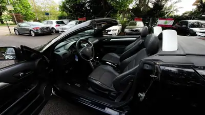 OPEL Tigra 1.8 Sport — Cabriolet compact dynamique, noir métallisé, 111'000 km — Miniature 7