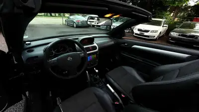 OPEL Tigra 1.8 Sport — Cabriolet compact dynamique, noir métallisé, 111'000 km — Miniature 8