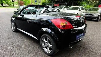 OPEL Tigra 1.8 Sport — Cabriolet compact dynamique, noir métallisé, 111'000 km — Miniature 12