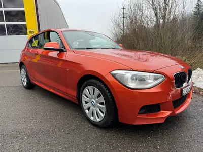 BMW 120d xDrive — Diesel performant, traction intégrale, révision à jour — side view