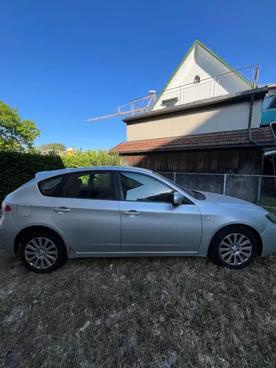 Subaru Impreza 2.0 R Swiss — Break polyvalent, transmission intégrale, sans sinistre — side view
