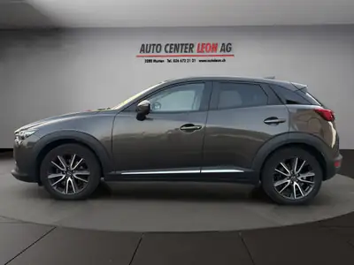Mazda CX-3 2.0 Revolution AWD — Compact SUV fiable, tout-terrain et bien équipé — arrière
