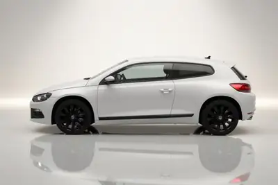VW Scirocco 1.4 TSI Design — Coupé sportif économe, entretien réduit — côté
