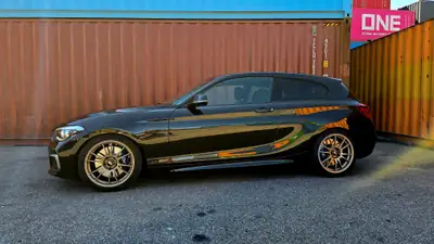 BMW M140i xDrive — Coupé sportif 340 ch, châssis KW, dernier modèle sans filtre à particules — Heckansicht