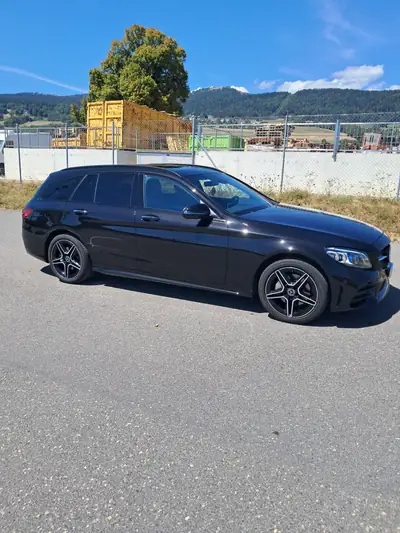 Mercedes-Benz C 220 d Swiss Star AMG Line — Break diesel 4x4, 69 000 km seulement — side view