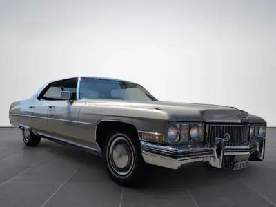 Cadillac DeVille 1973 — Coupé américain légendaire, moteur V8 puissant — side view