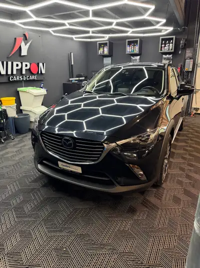 Mazda CX-3 2.0 Revolution AWD — SUV compact polyvalent, entretien récent et équipé — côté