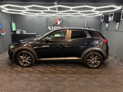 Mazda CX-3 2.0 Revolution AWD — SUV compact polyvalent, entretien récent et équipé — intérieur
