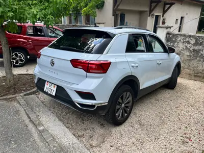 VW T-ROC 1.0 TSI Advance — SUV urbain agile, 90'000 km, sans sinistre — side view