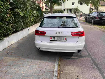 Audi A6 Avant 3.0 V6 TDI 313 quattro — Break premium 4x4, équipements haut de gamme — côté