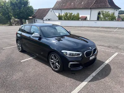 BMW M135i xDrive 2015 — Berline sport haute performance, 326 ch et transmission intégrale — exterior view