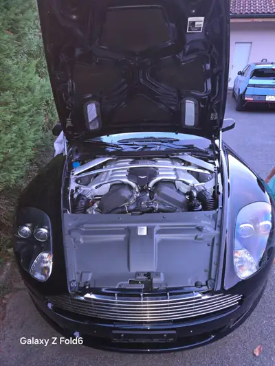 Aston Martin DB9 5.9 V12 — Cabriolet prestige 455 ch, 70'000 km seulement — rear view