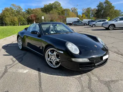 Porsche 911 Carrera 4 Cabriolet — 325 ch, toit ouvert, sans accident — exterior view
