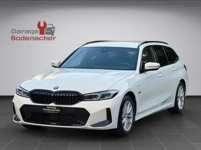 BMW 330e xDrive Touring — Hybride rechargeable performant, 100 000 km, M Sport — côté