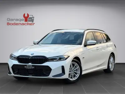 BMW 330e xDrive Touring — Hybride rechargeable performant, 100 000 km, M Sport — vue extérieure