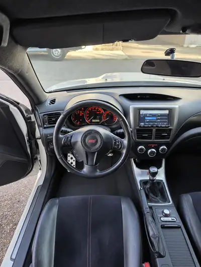 Subaru WRX STI 2012 — Berline sportive mythique, 301 ch et transmission manuelle — Miniatur 7