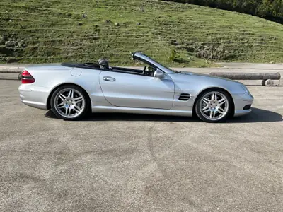 Mercedes-Benz SL 55 AMG — Roadster légendaire, 500 ch, boîte auto — fianco