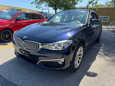 BMW 320 Gran Turismo xDrive — Diesel efficace, tous chemins, 184 500 km — côté