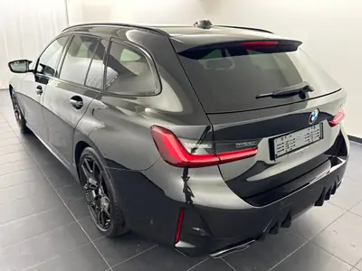 BMW M340d xDrive — Break sportif diesel hybride, 11 000 km, garantie 3 ans — côté