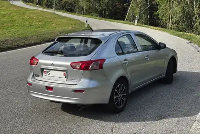 Mitsubishi Lancer 1.6 MIVEC Pure — Break pratique, excellent état, très peu kilométré — dashboard