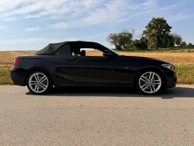 BMW 230i Cabriolet — Élégance décapotable, 50'000 km seulement — côté