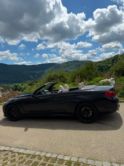 BMW 440i xDrive Cabriolet — Décapotable sportive 326 ch, toit ouvert, 72 000 km — vue extérieure