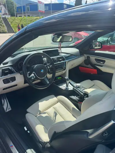 BMW 440i xDrive Cabriolet — Décapotable sportive 326 ch, toit ouvert, 72 000 km — tableau de bord