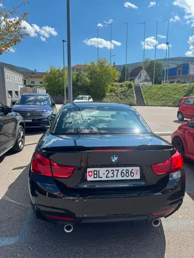 BMW 440i xDrive Cabriolet — Décapotable sportive 326 ch, toit ouvert, 72 000 km — intérieur