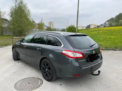 Peugeot 508 Break 1.6i — Break familial automatique, attelage et toit équipés — côté