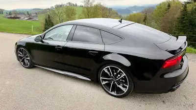 Audi RS7 Performance 4.0 TFSI Quattro — 605 ch, motorisation légendaire, kilométrage modéré — side view