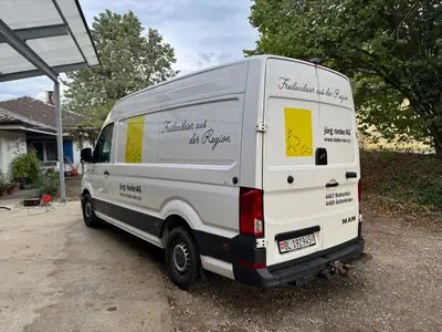 MAN TGE 3.180 4x4 — Utilitaire tout-terrain robuste, moteur récent et fiable — side view