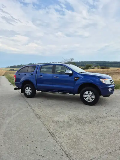 Ford Ranger 2.2 TDCi 4x4 XLT — Pick-up robuste, motorisation fiable et consommation maîtrisée — fianco