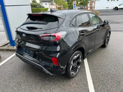 Ford Puma 1.0 MHEV ST-Line X — SUV compact hybride, 30 km seulement — fianco