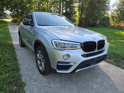 BMW X4 20d xDrive — SUV coupé diesel performant, 168'000 km, sans sinistre — côté