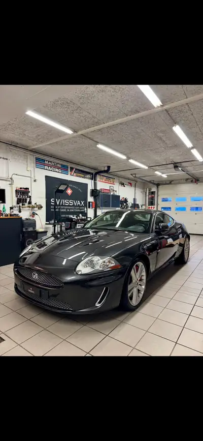 Jaguar XKR 2011 — Coupé sport britannique 510 ch, sans accident — côté