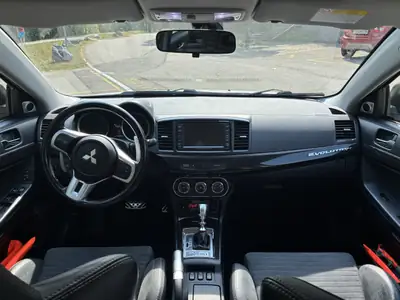 Mitsubishi Lancer 2.0 T MIVEC Evolution MR — Performance sportive 367 ch, 82000 km — Miniatura 10