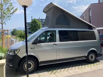 VW Transporter T6 2.0 TDI 150 4Motion — Campervan aménagé, 4×4 polyvalent — vue extérieure