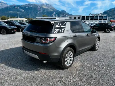 Land Rover Discovery Sport 2.0 Si4 HSE — SUV premium 7 places, moteur essence 240 ch — fianco